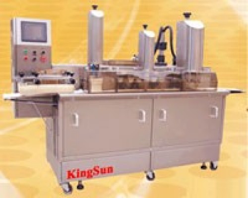 Máy đưa nhân trứng vào bánh trung thu